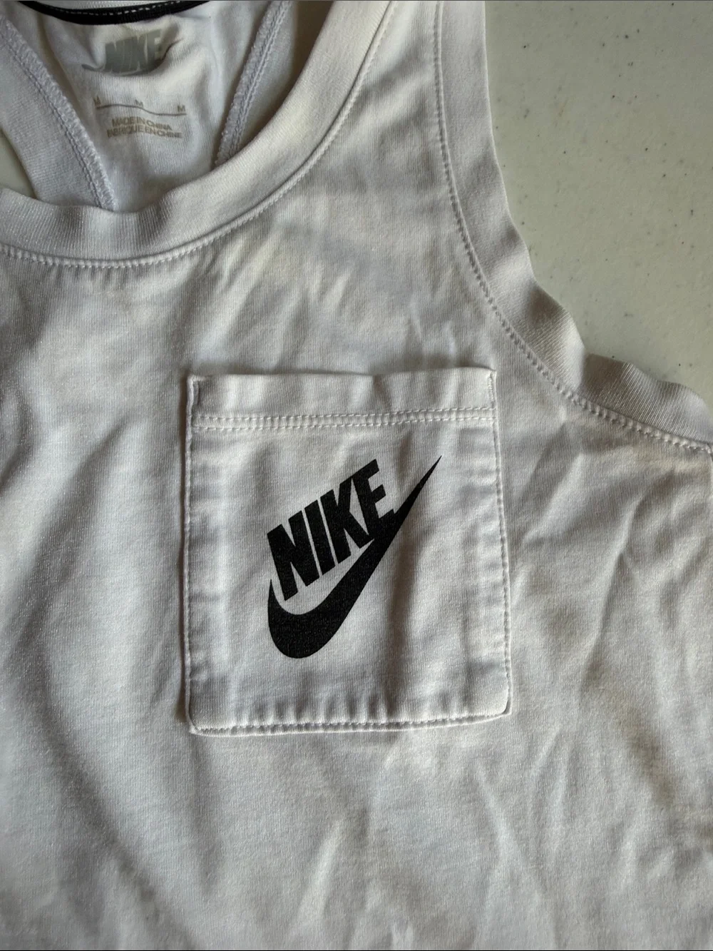 Youth White Tank Top with Black Swoosh Pocket